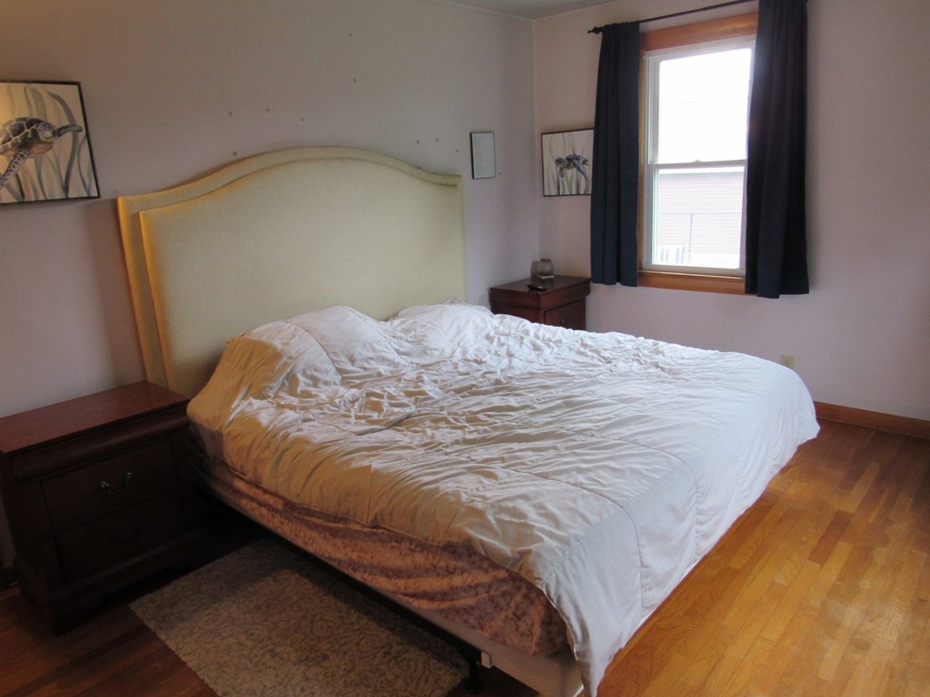 2340 Main Street Three Rivers, MA 01080 - Photo 23 of 31 a bedroom with a bed and a window