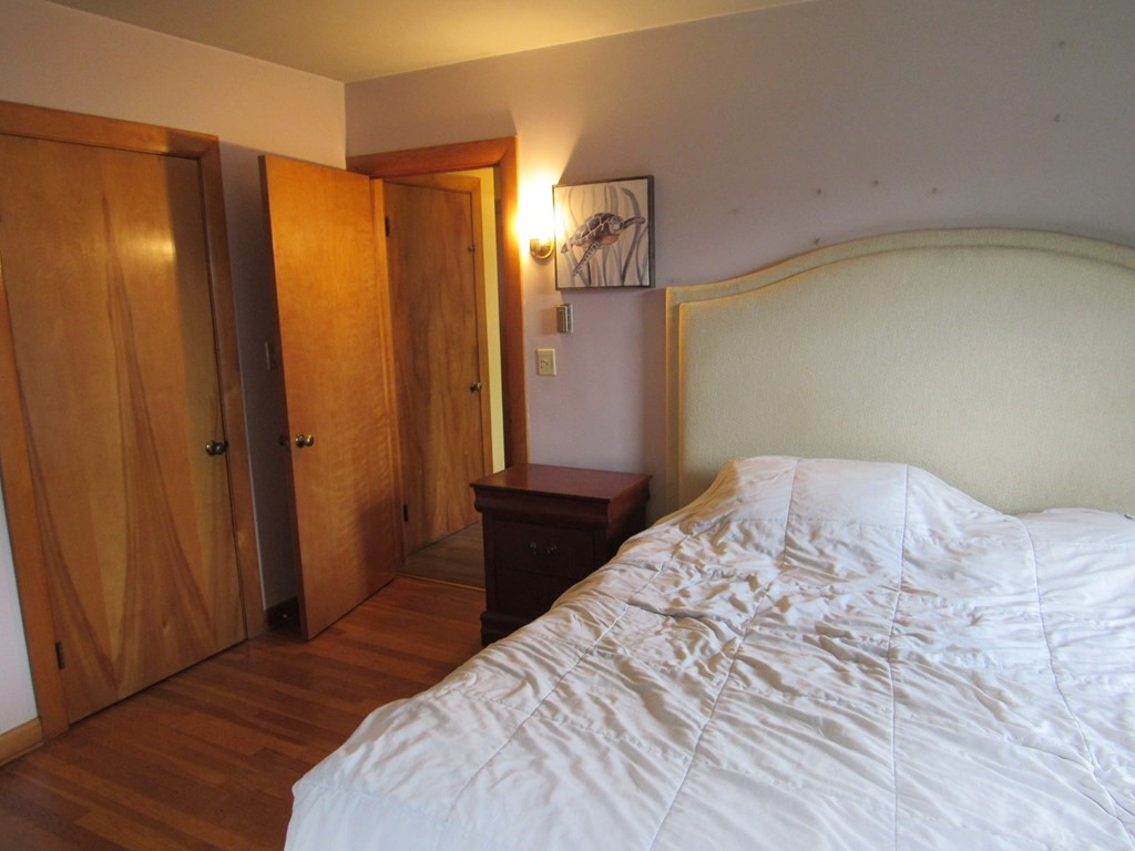 2340 Main Street Three Rivers, MA 01080 - Photo 25 of 31 a bedroom with a bed and a mirror