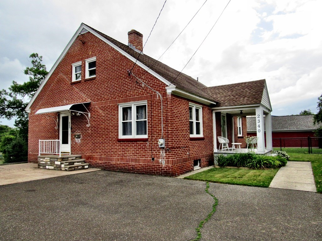 2340 Main Street Three Rivers, MA 01080 - Photo 5 of 31 front view of house with a yard