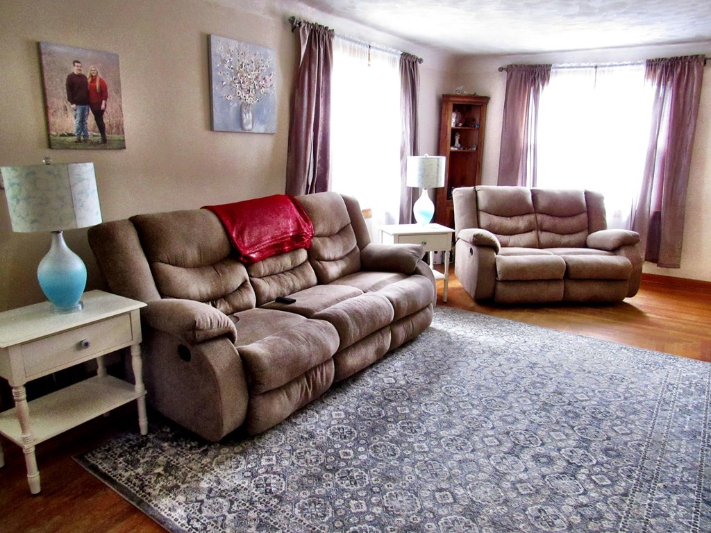 2340 Main Street Three Rivers, MA 01080 - Photo 10 of 31 a living room with furniture and a window