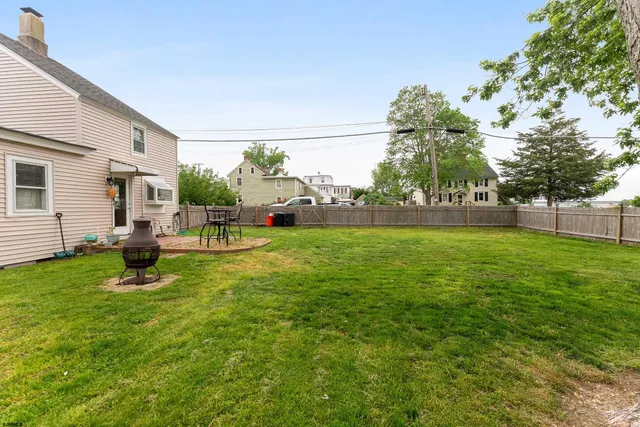 a view of a park with large trees