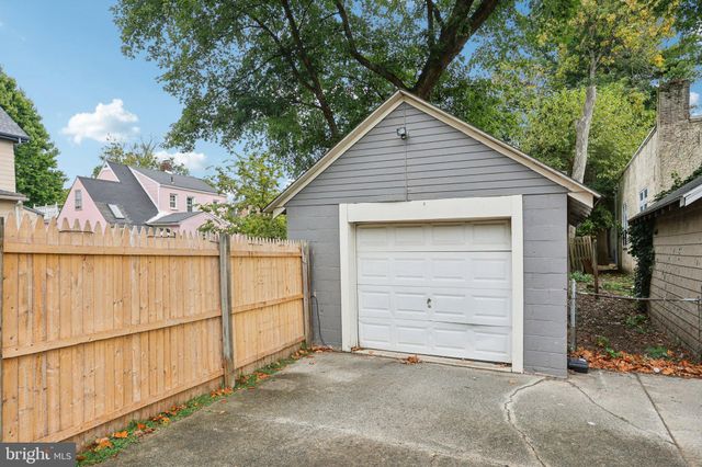 a front view of a house with a garage