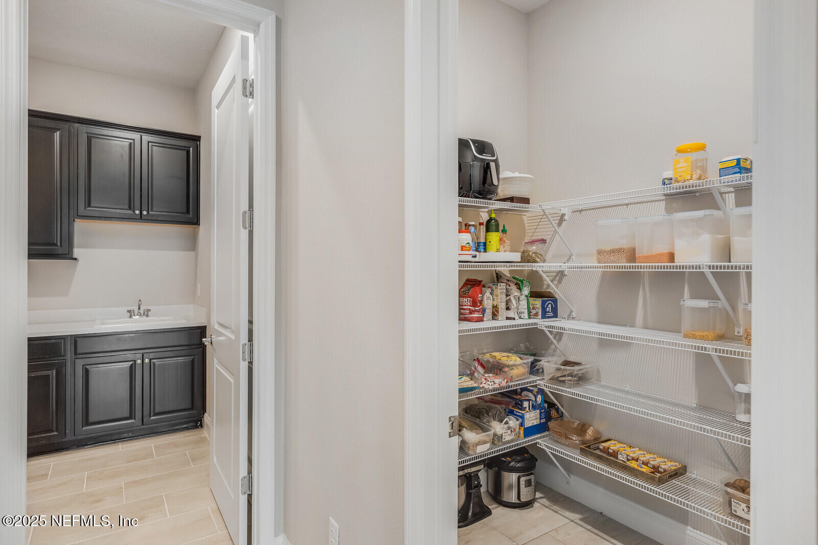 70 Pavo Circle St. Johns, FL 32259 - Photo 10 of 63 a room with a book shelf and a wooden floor