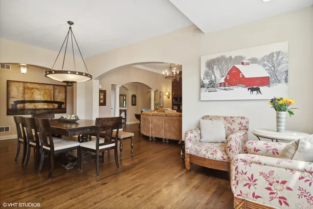 a living room with furniture fireplace and flat screen tv