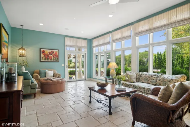 a view of living room kitchen and entryway