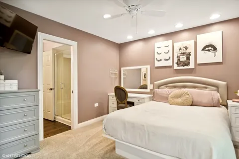 a front view of a house with a garden and porch