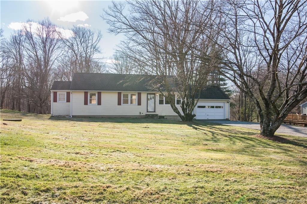 Set on a perfectly level 1 acre: Welcome to 37 Milltown Road