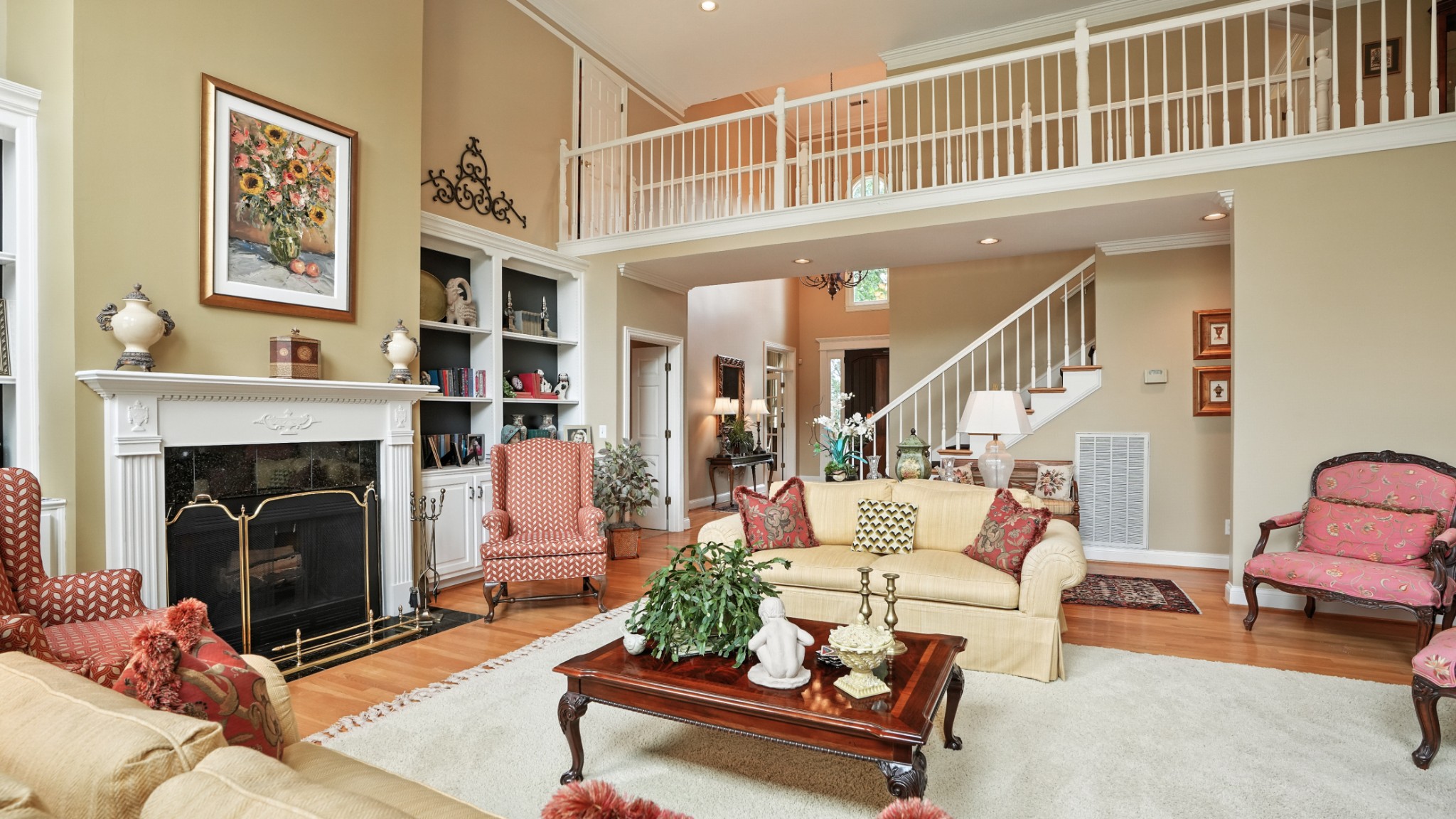 216 Lake Ridge Court Franklin, TN 37069 - Photo 20 of 75 a living room with furniture and a fireplace