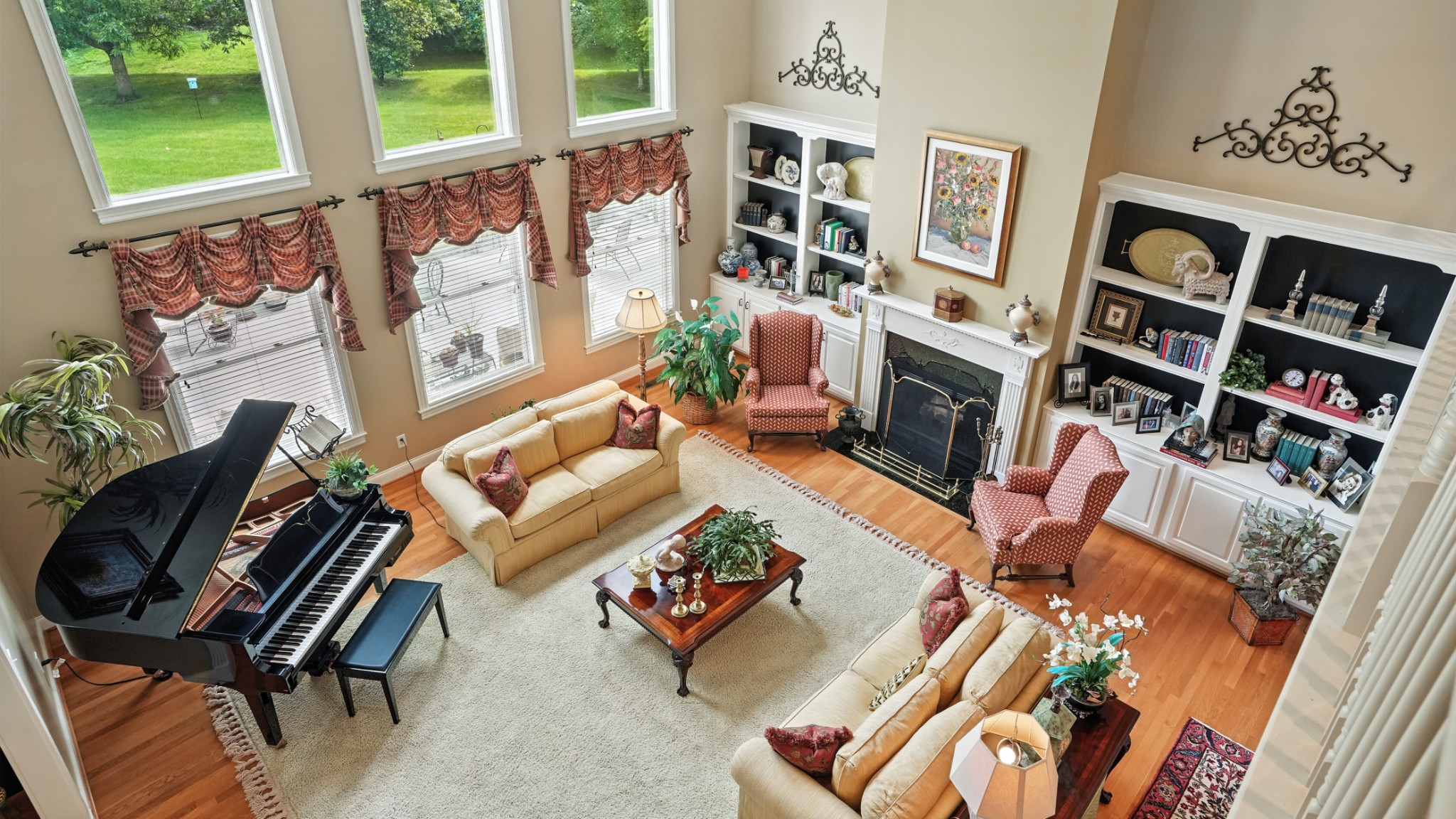 216 Lake Ridge Court Franklin, TN 37069 - Photo 21 of 75 a living room with fireplace furniture and a book shelf