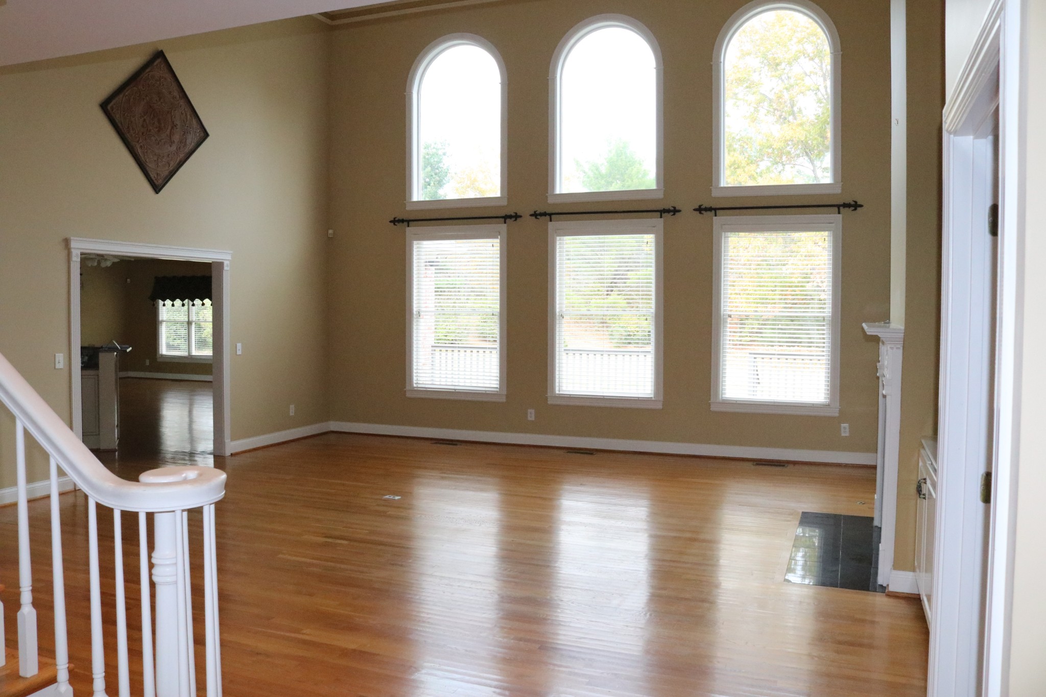 216 Lake Ridge Court Franklin, TN 37069 - Photo 23 of 75 a view of empty room with wooden floor and fan