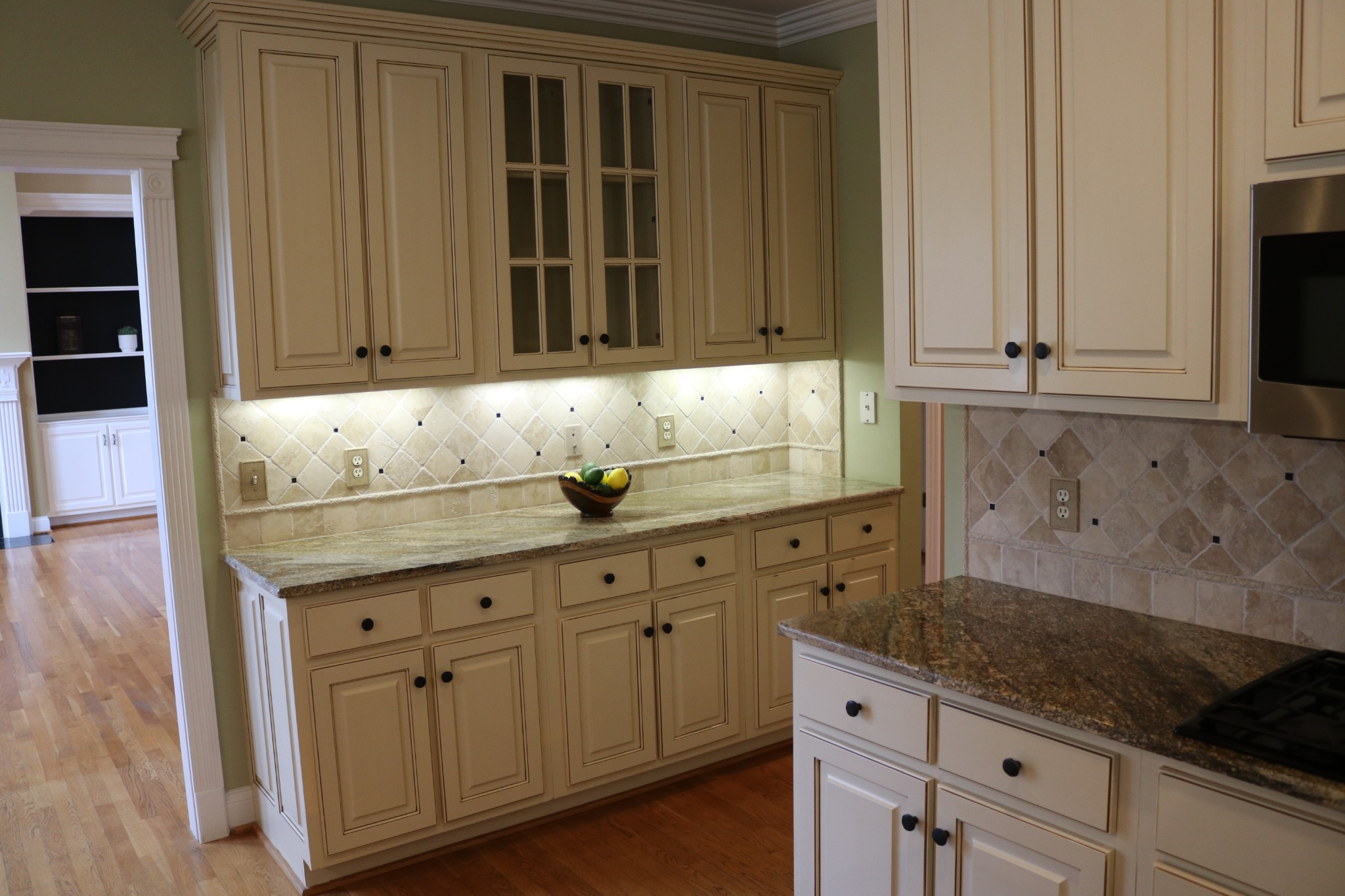 216 Lake Ridge Court Franklin, TN 37069 - Photo 34 of 75 a kitchen with granite countertop white cabinets and sink