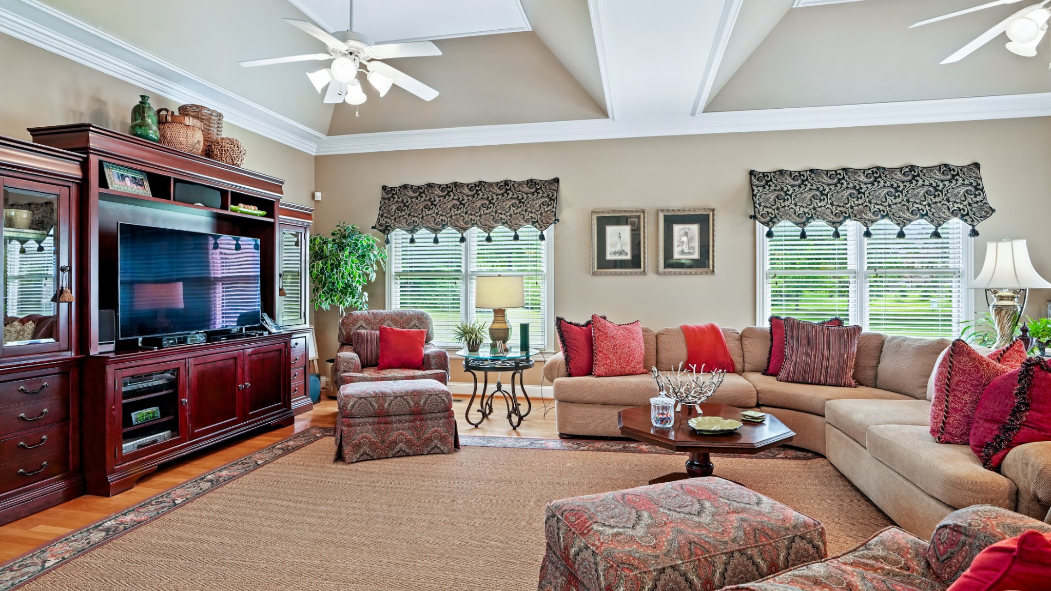 216 Lake Ridge Court Franklin, TN 37069 - Photo 38 of 75 a living room with furniture a flat screen tv and a large window