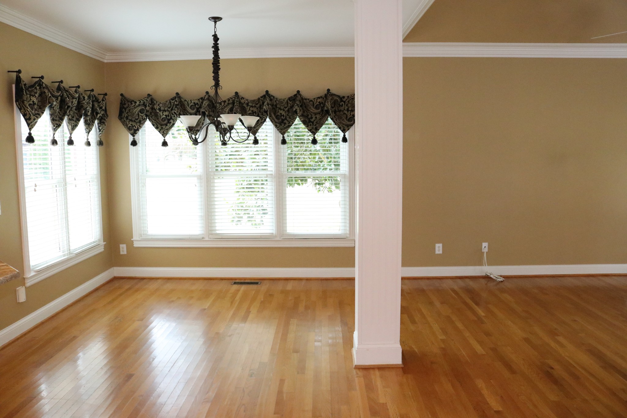 216 Lake Ridge Court Franklin, TN 37069 - Photo 40 of 75 a view of an empty room with window wooden floor and windows