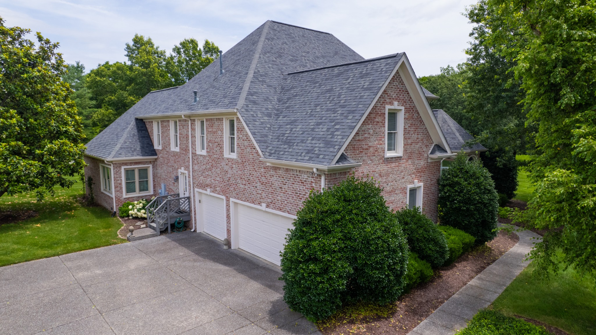 216 Lake Ridge Court Franklin, TN 37069 - Photo 4 of 75 a aerial view of a house with garden