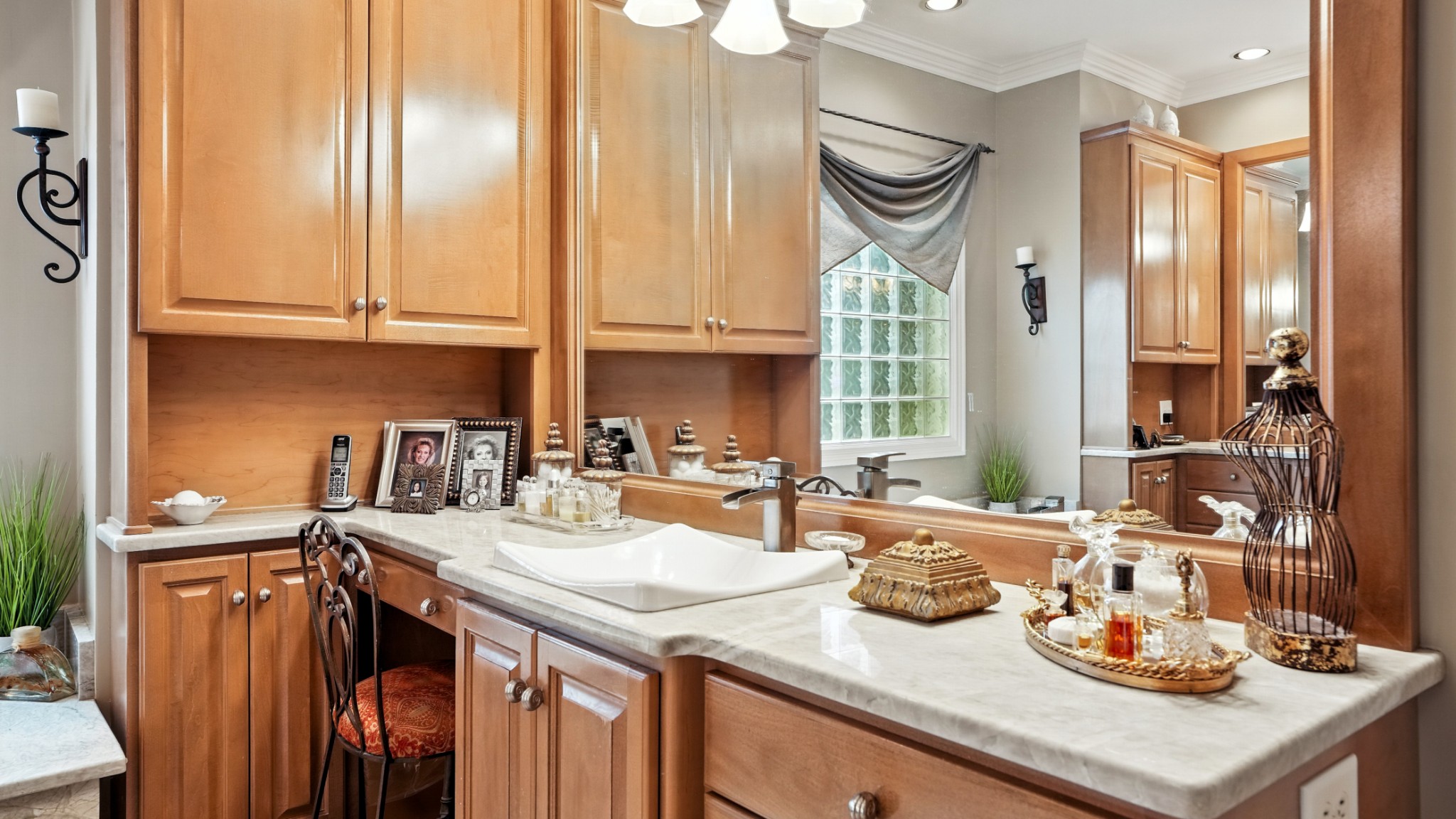 216 Lake Ridge Court Franklin, TN 37069 - Photo 49 of 75 a kitchen with granite countertop a sink a stove and cabinets