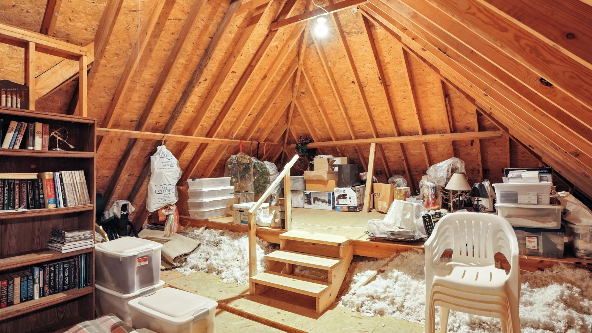 216 Lake Ridge Court Franklin, TN 37069 - Photo 62 of 75 a living room with furniture a rug and a book shelf
