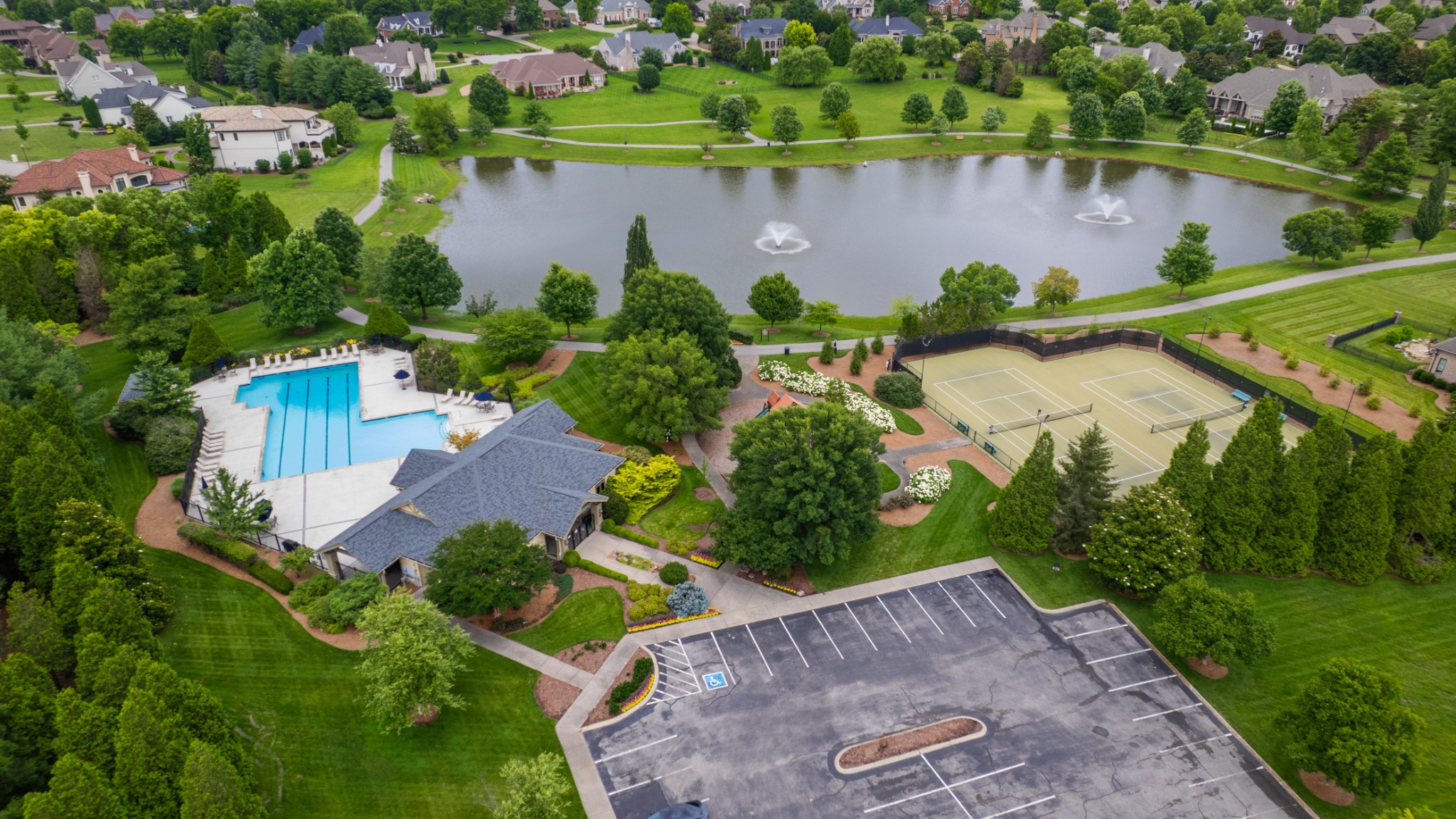 216 Lake Ridge Court Franklin, TN 37069 - Photo 73 of 75 an aerial view of a house with outdoor space and a lake view