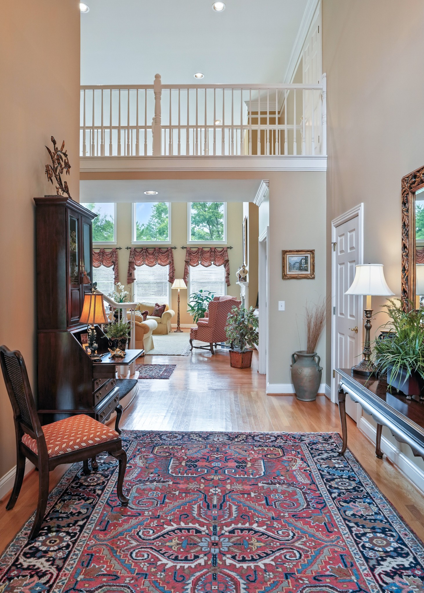 216 Lake Ridge Court Franklin, TN 37069 - Photo 8 of 75 a living room with furniture and a rug