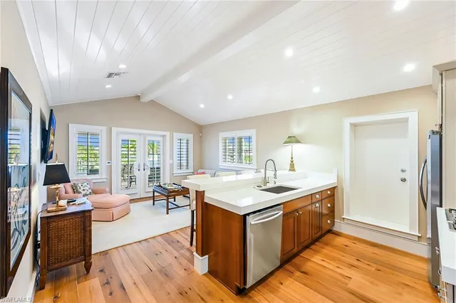 a kitchen with a stove and a refrigerator