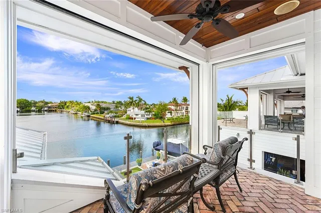 a bathroom with a sink a vanity a mirror and a shower