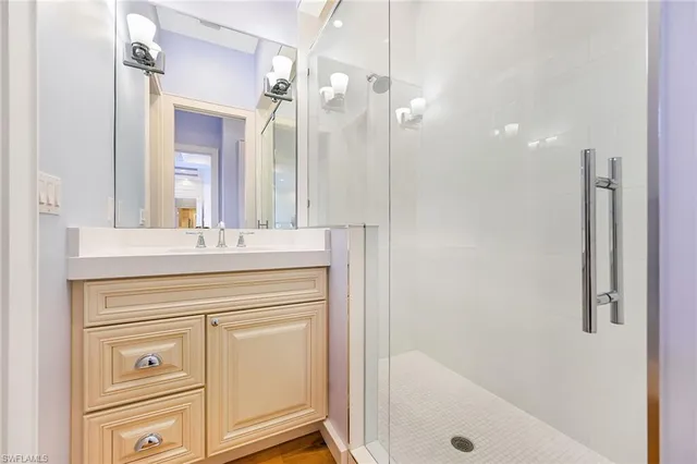 a kitchen with a sink and a washer dryer
