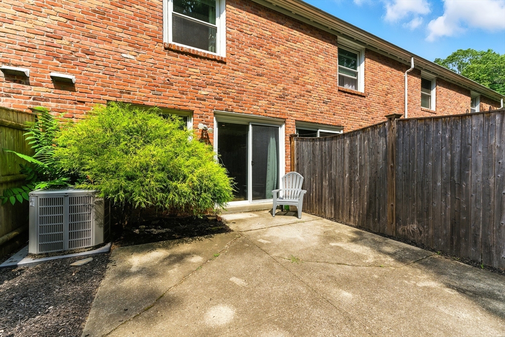 73 Yorktown Drive, Unit 73 Springfield, MA 01108 - Photo 25 of 42 a view of a house with backyard and garden