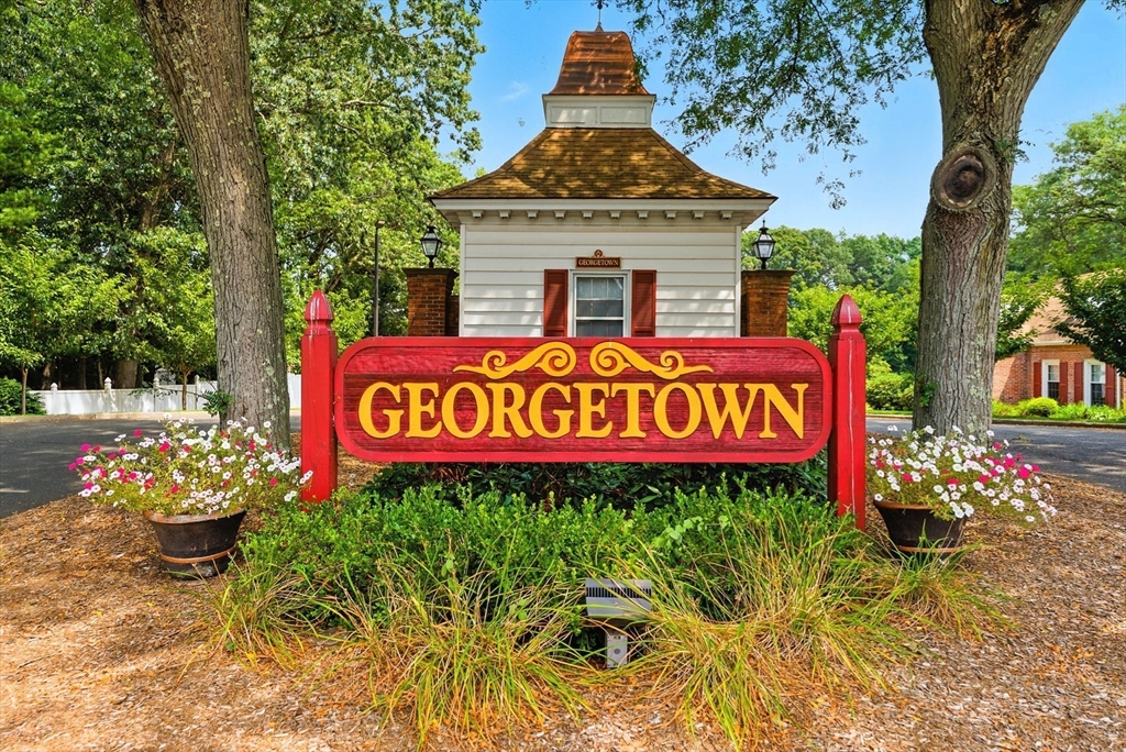 73 Yorktown Drive, Unit 73 Springfield, MA 01108 - Photo 32 of 42 a front view of a house with a yard