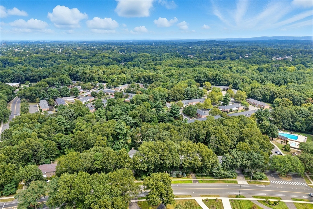 73 Yorktown Drive, Unit 73 Springfield, MA 01108 - Photo 36 of 42 an aerial view of residential houses with outdoor space and trees