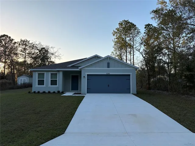 a house view with a garden space