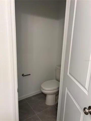 a bathroom with a glass door shower