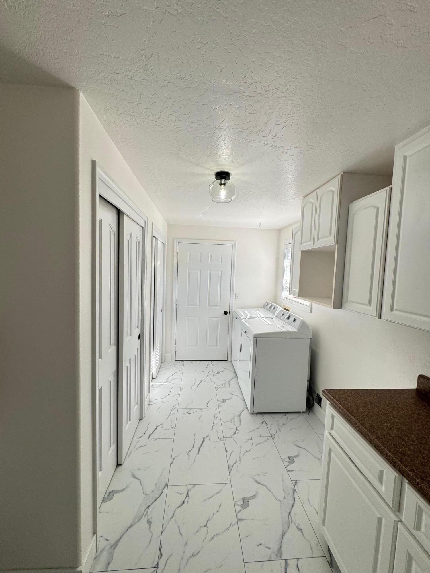 2818 Table Rock Road Medford, OR 97501 - Photo 10 of 21 Laundry room, with storage