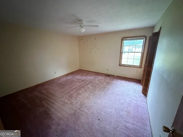 an empty room with a window