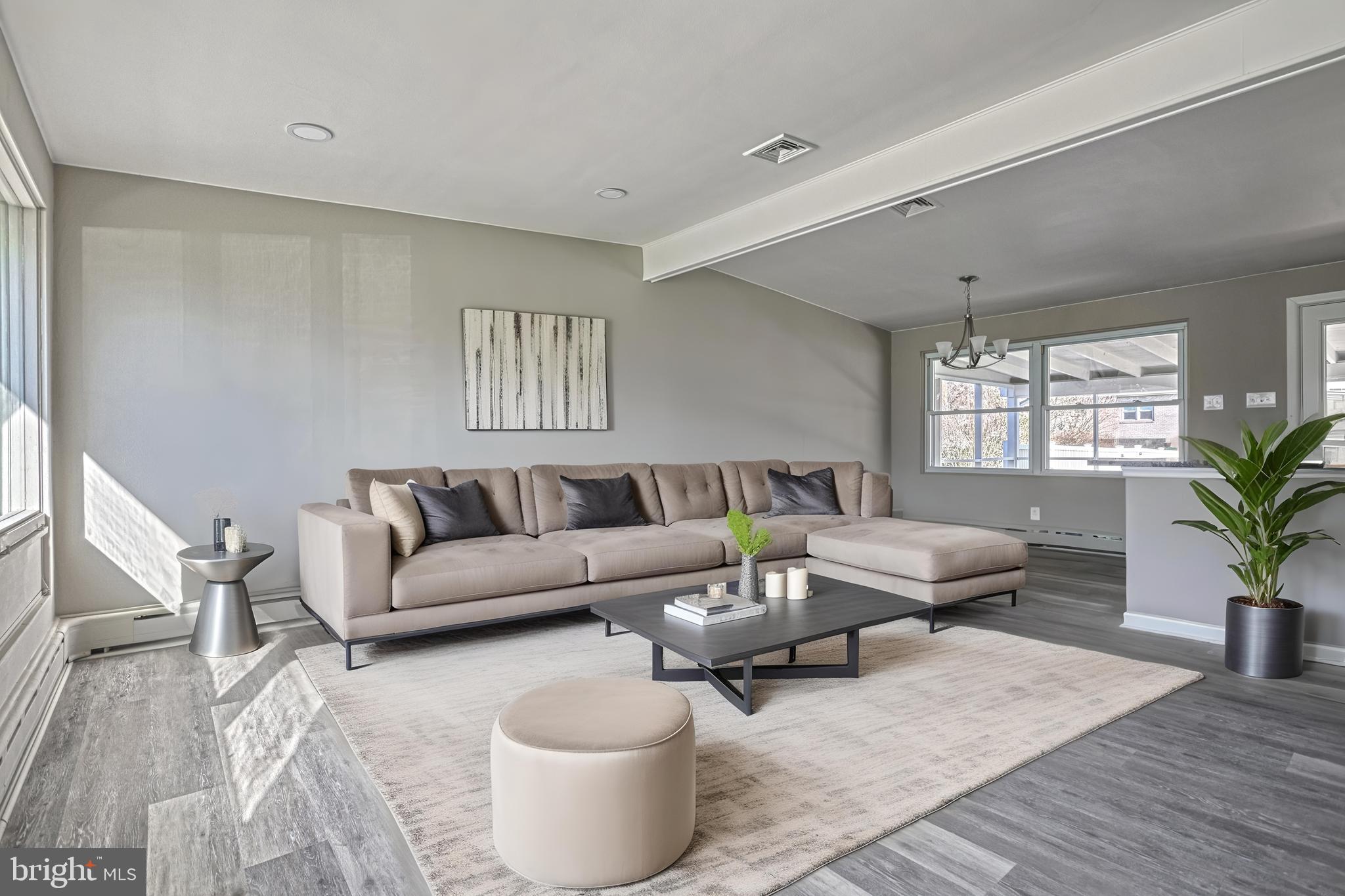 13 Cornell Drive Camp Hill, PA 17011 - Photo 14 of 76 a living room with furniture and a potted plant