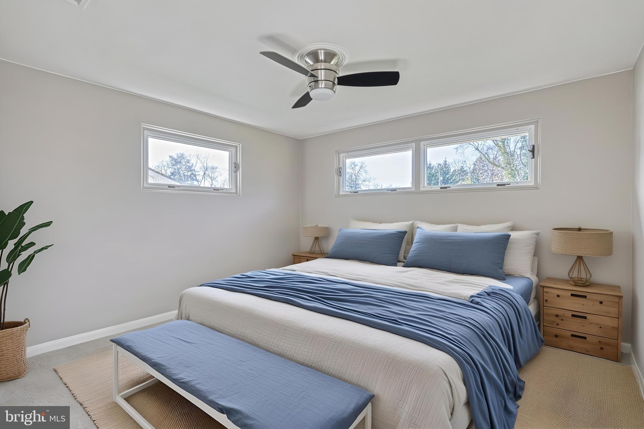 13 Cornell Drive Camp Hill, PA 17011 - Photo 33 of 76 a bedroom with a bed and a potted plant