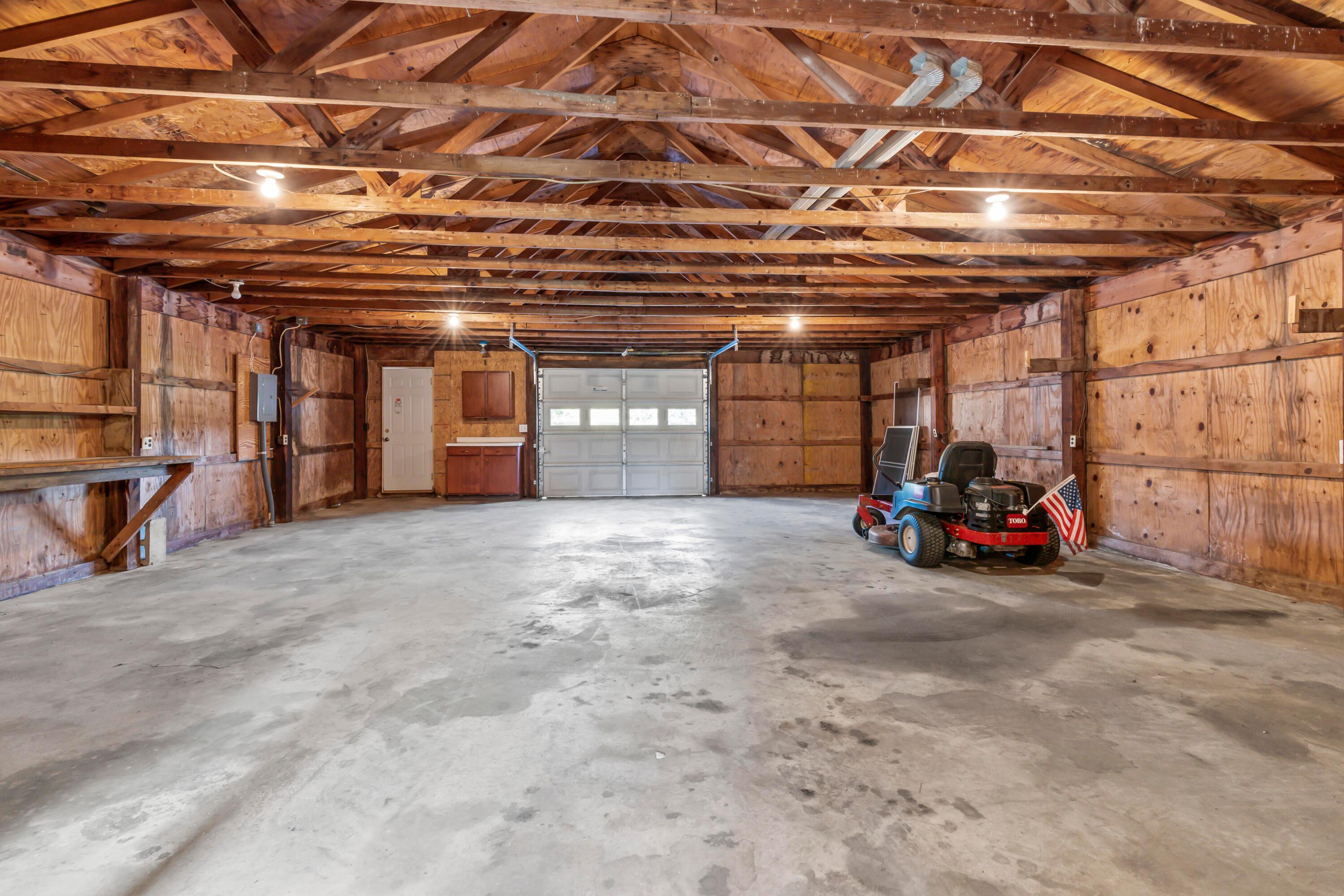 5764 Cheshire Road Galena, OH 43021 - Photo 44 of 59 • Vinyl exterior
• Concrete floor
• Loft area
• Service door
• Electric from house
• (2) garage doors
• Cabinets