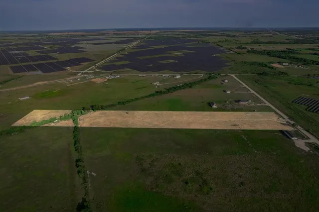 a view of a lake from a yard