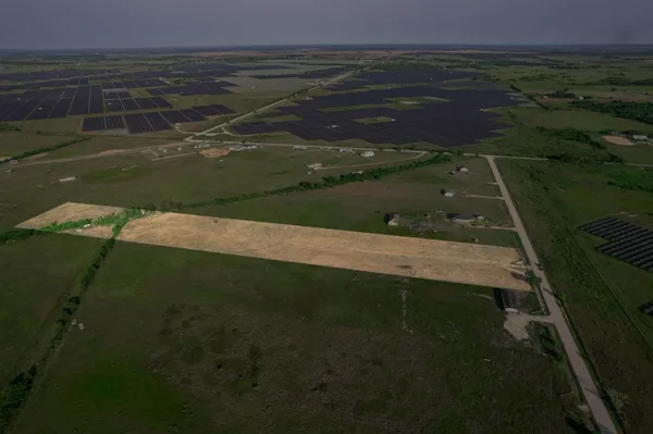 a view of a lake from a yard