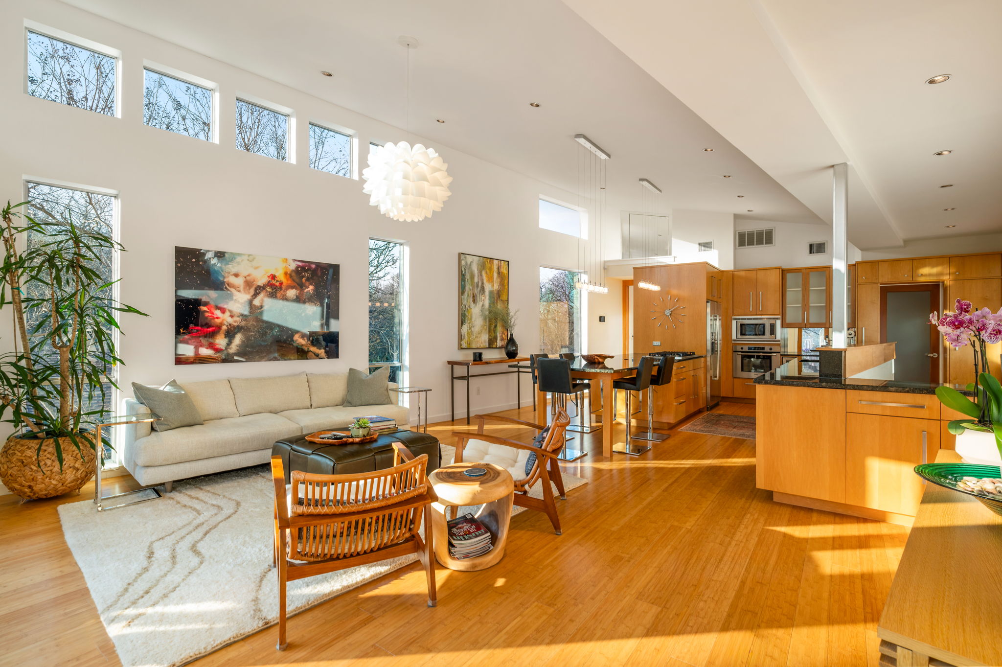 1700 Ravey Street, Unit A Austin, TX 78704 - Photo 9 of 40 Living area with a high ceiling and light wood-style floors