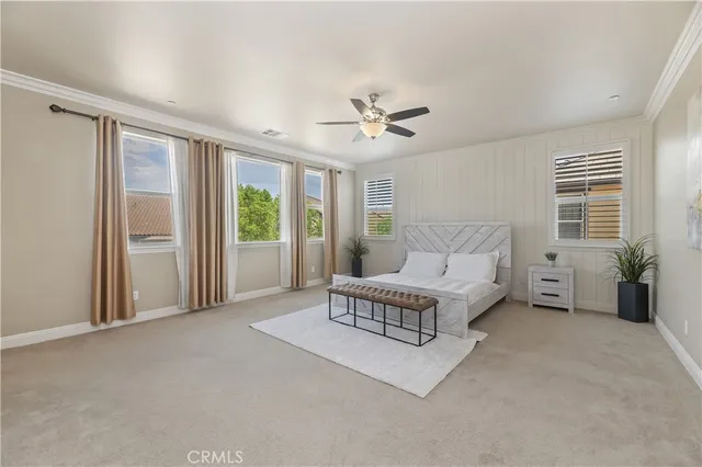 a view of a livingroom with an empty space and a fireplace