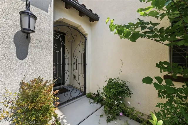 a living room with fireplace furniture and hard wood flooring