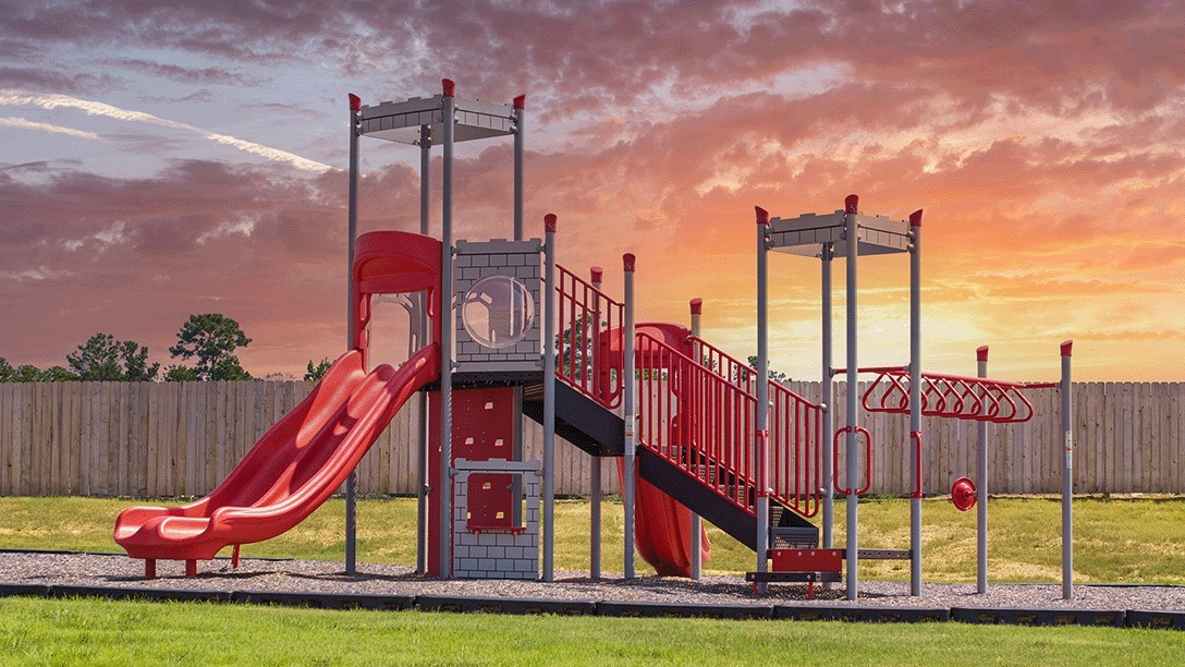 13150 Turret Bend Way Willis, TX 77378 - Photo 7 of 9 a view of a park with a slide and potted plants