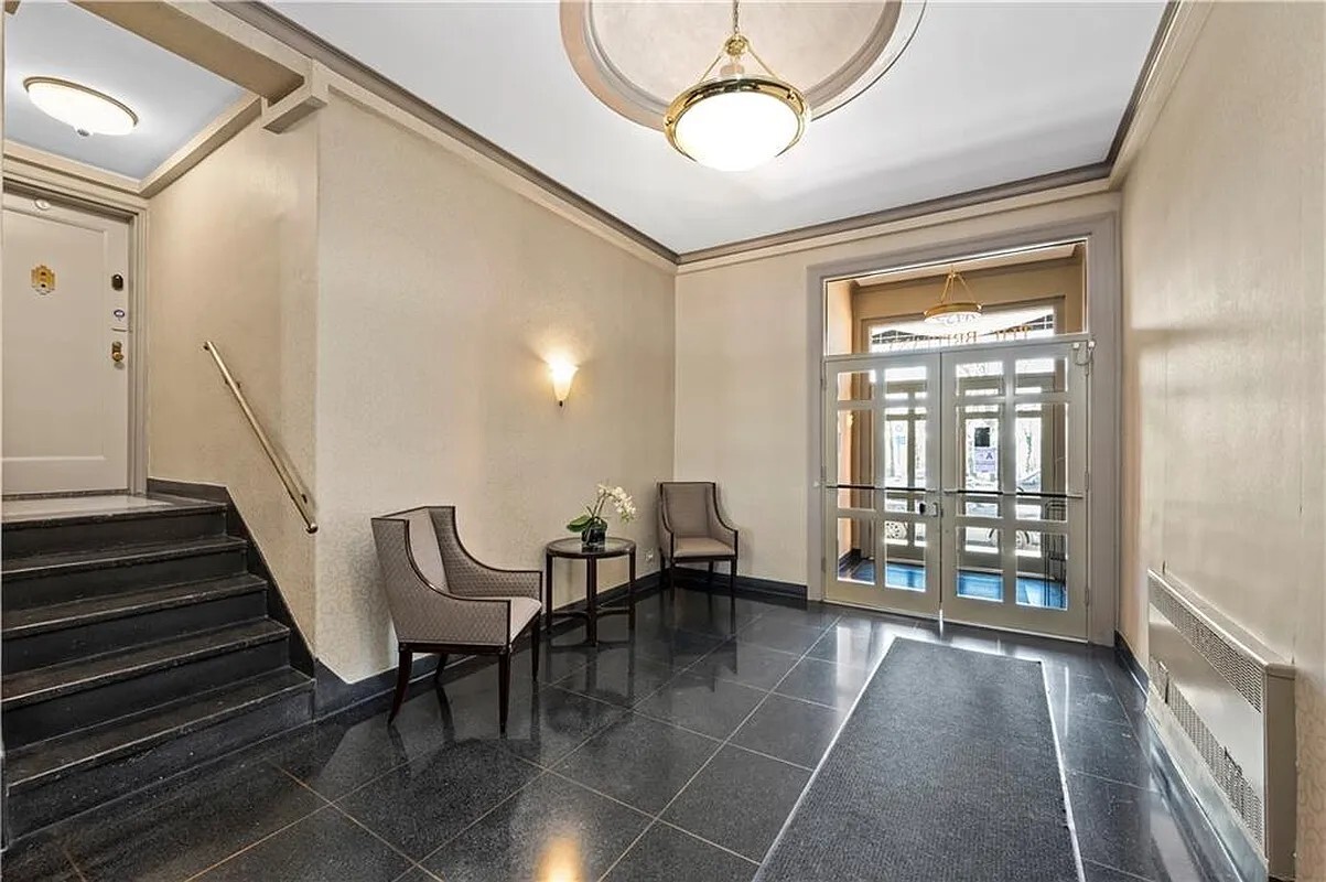 9425 Shore Road, Unit 1H Brooklyn, NY 11209 - Photo 7 of 10 a living room with furniture and wooden floor