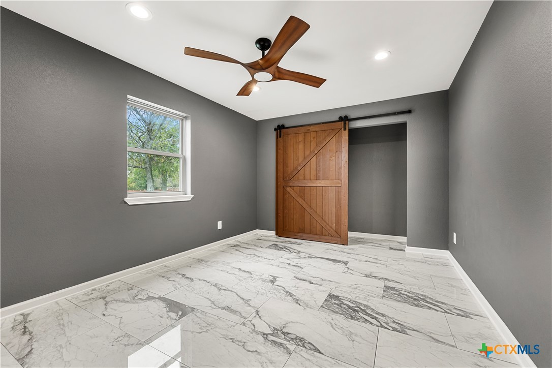 3216 Wendy Lane Kempner, TX 76539 - Photo 14 of 23 a bed room with a bed and a window