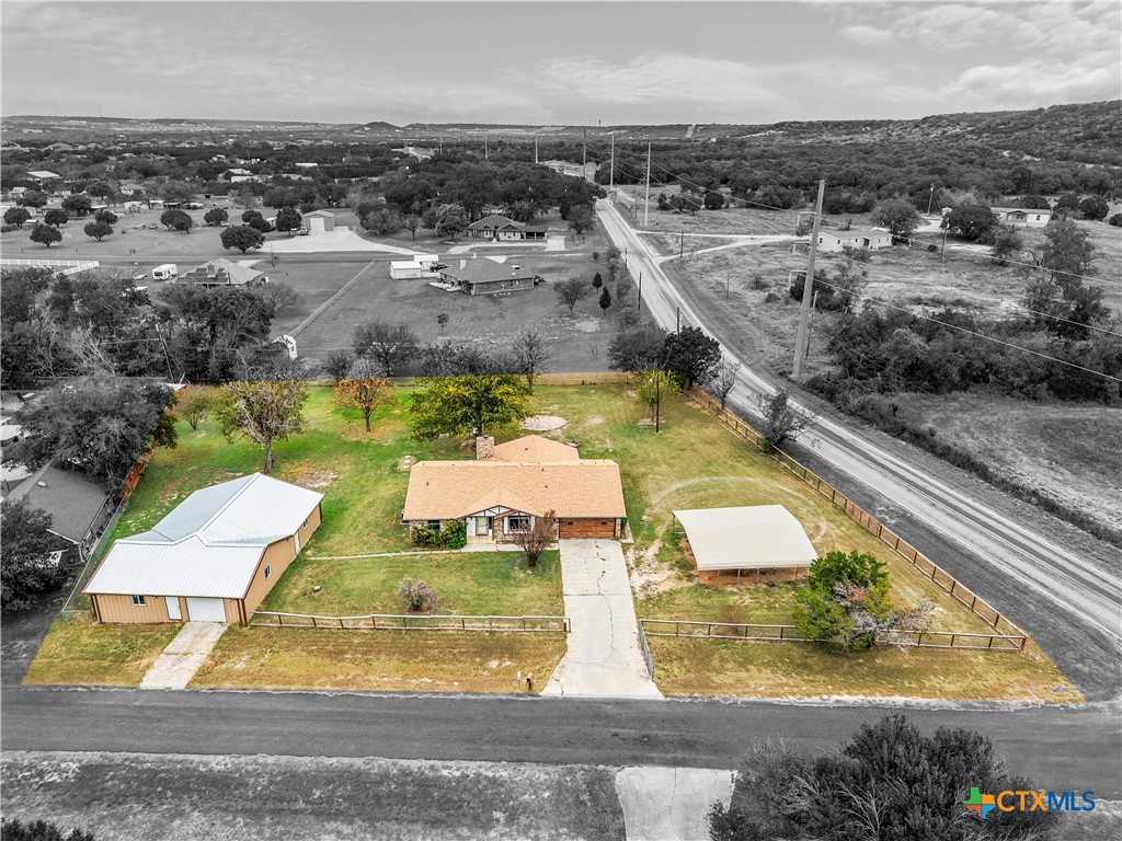 3216 Wendy Lane Kempner, TX 76539 - Photo 2 of 23 an aerial view of a swimming pool with a yard and lake view