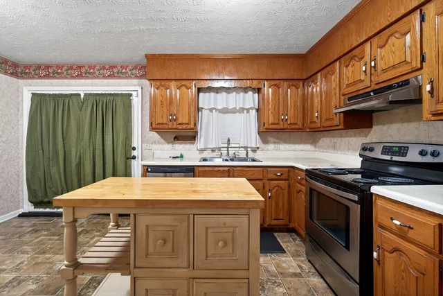 a bathroom with a sink a mirror and a toilet