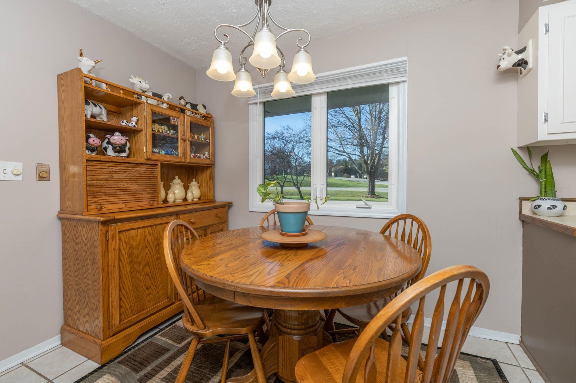 90 Lake Summerset Road Lake Summerset, IL 61019 - Photo 12 of 35 a view of a dining room with furniture window and outside view