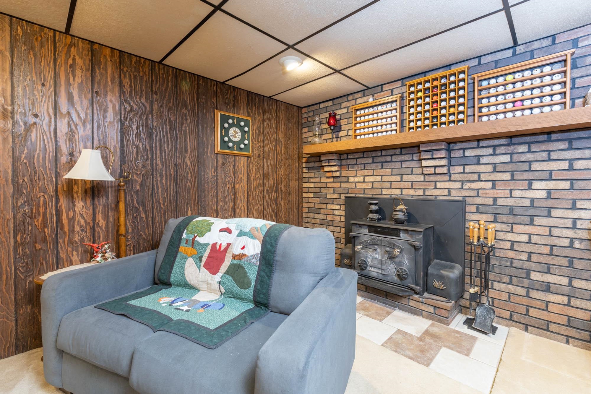 90 Lake Summerset Road Lake Summerset, IL 61019 - Photo 23 of 35 a living room with furniture and a fireplace