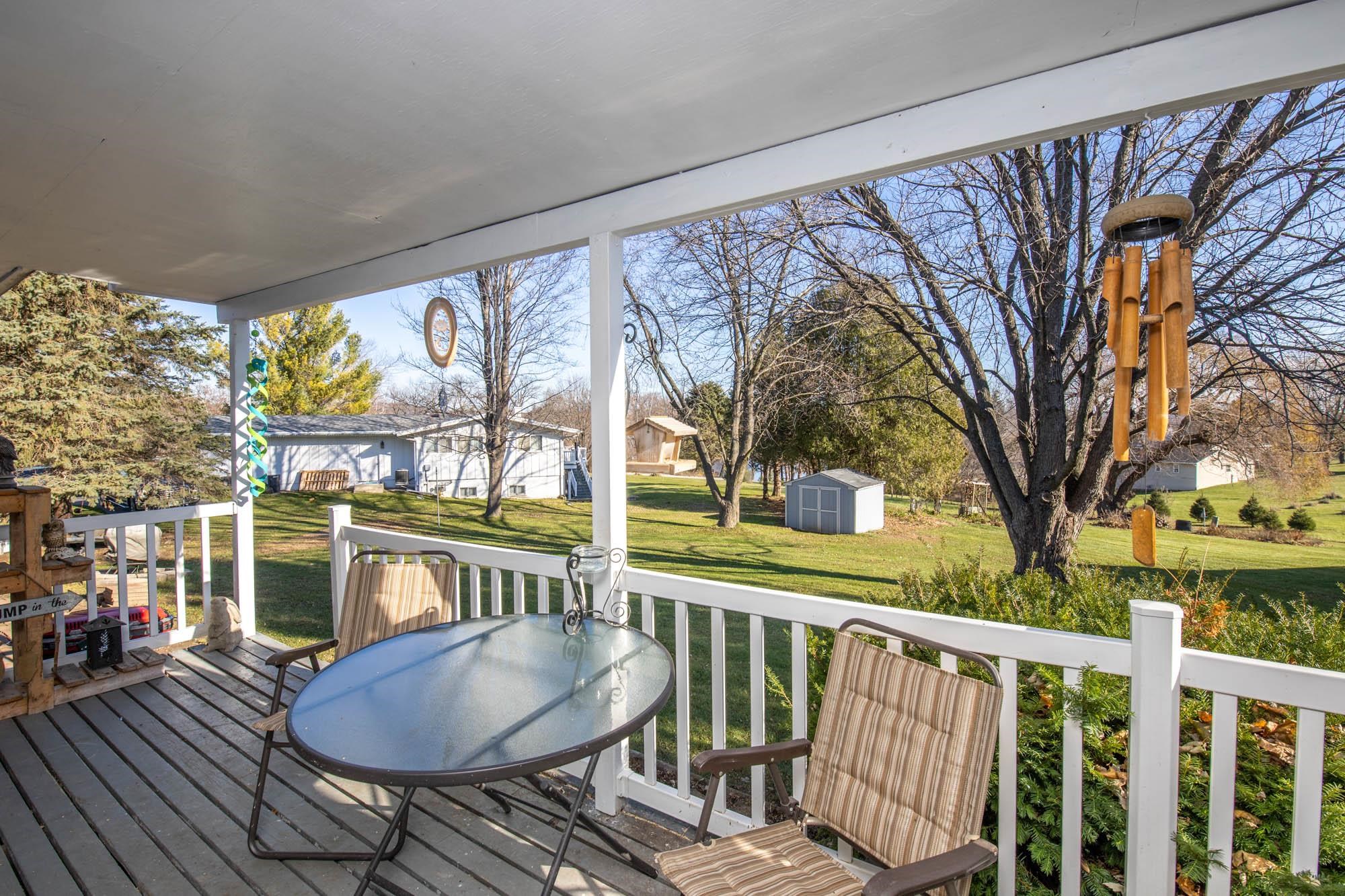 90 Lake Summerset Road Lake Summerset, IL 61019 - Photo 29 of 35 a view of a chairs and table in the balcony
