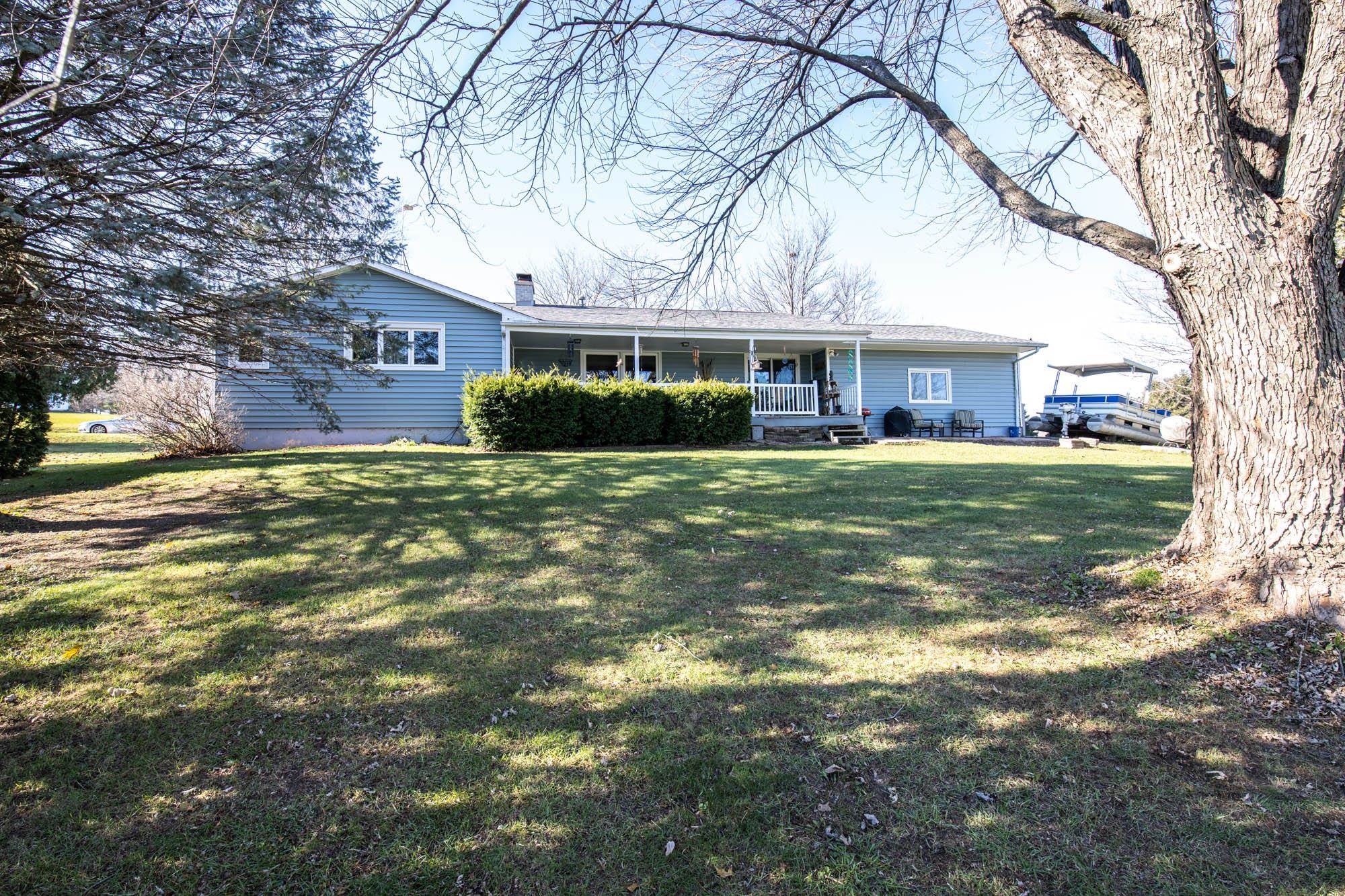 90 Lake Summerset Road Lake Summerset, IL 61019 - Photo 34 of 35 a view of a house with a yard