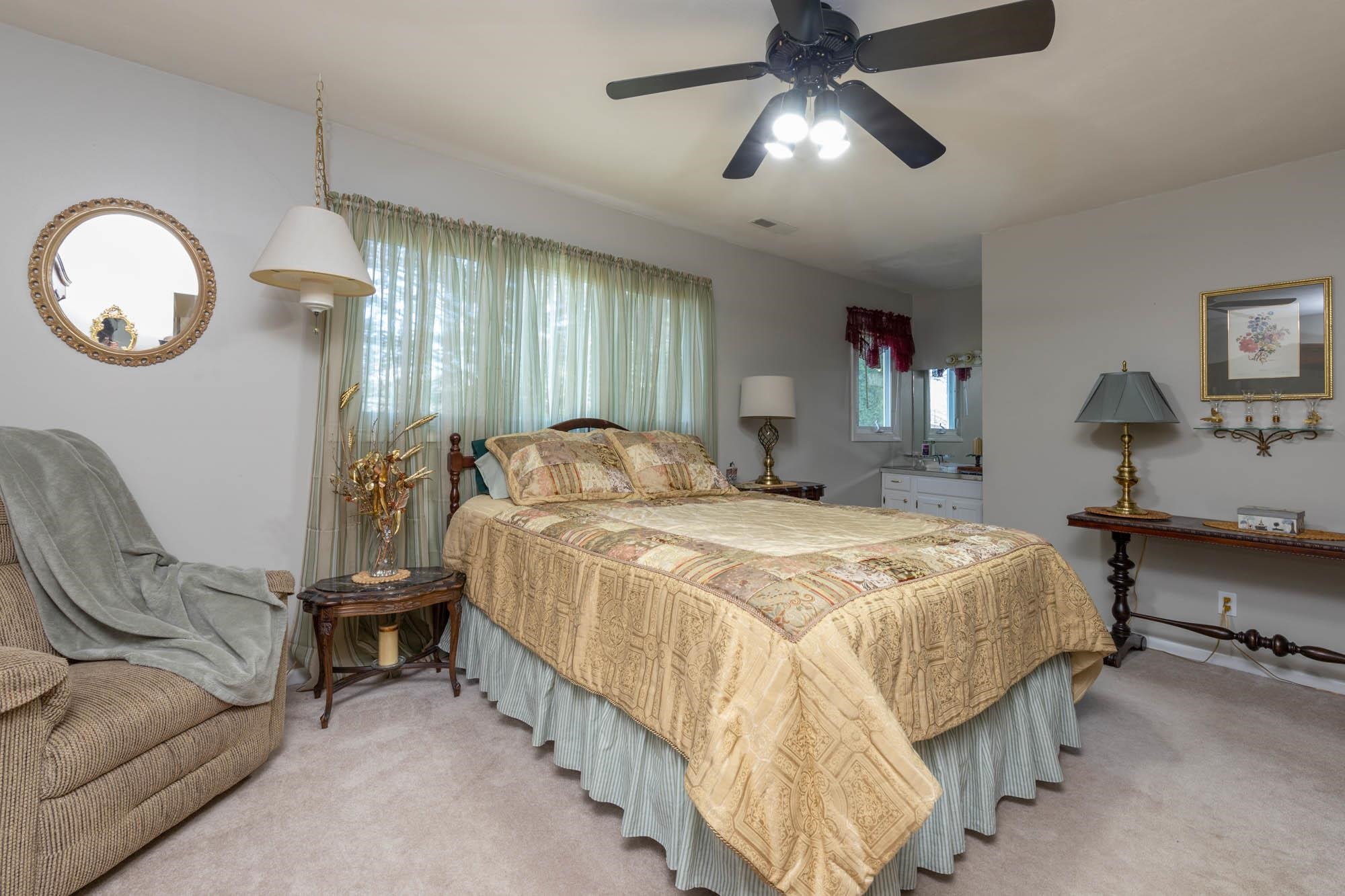 90 Lake Summerset Road Lake Summerset, IL 61019 - Photo 35 of 35 a bedroom with bed and window